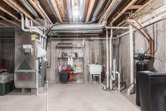 2182 Waterbury Ln E Unit 2182, Sycamore, IL 60178 - unfinished basement featuring a water softener and heating unit