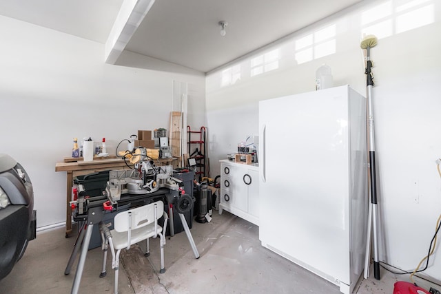 2182 Waterbury Ln E Unit 2182, Sycamore, IL 60178 - miscellaneous room with a workshop area and concrete flooring