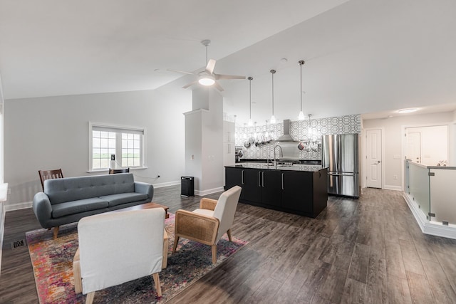 2182 Waterbury Ln E Unit 2182, Sycamore, IL 60178 - living area featuring a ceiling fan, dark wood-style flooring, and high vaulted ceiling