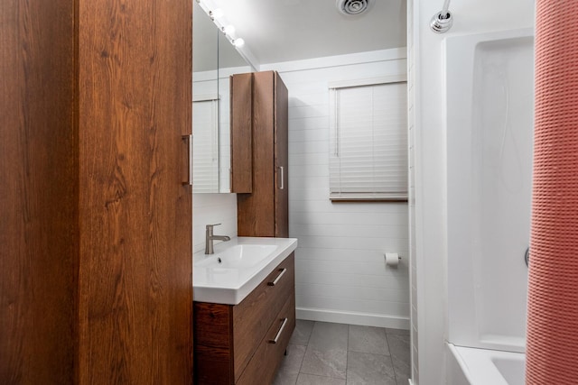 2519 Cherie Ln, Ottawa, IL 61350 - bathroom with vanity, bathing tub / shower combination, and tile patterned floors