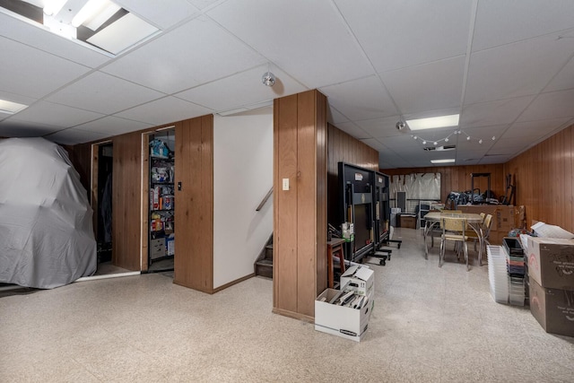 2519 Cherie Ln, Ottawa, IL 61350 - finished below grade area featuring a paneled ceiling, wooden walls, and stairs