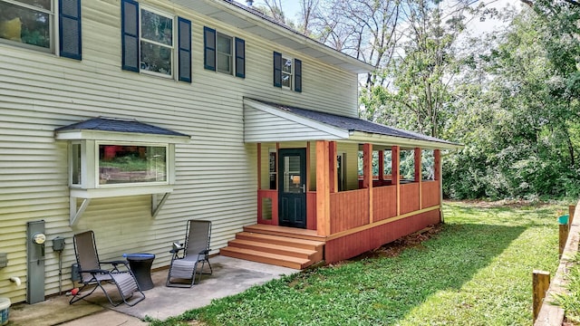 2519 Cherie Ln, Ottawa, IL 61350 - rear view of house featuring a lawn and a patio area
