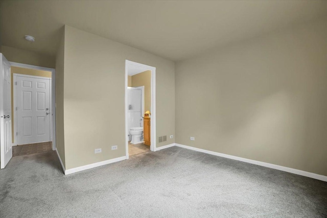 157 Concord Dr, Oswego, IL 60543 - unfurnished bedroom with carpet and ensuite bathroom