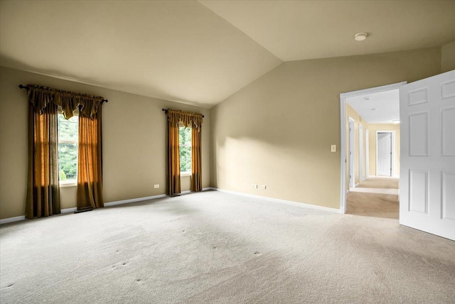 157 Concord Dr, Oswego, IL 60543 - carpeted spare room featuring vaulted ceiling and a smoke detector