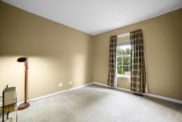 157 Concord Dr, Oswego, IL 60543 - empty room with carpet floors and baseboards