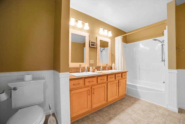 157 Concord Dr, Oswego, IL 60543 - full bathroom with wainscoting, double vanity, and shower / bath combo
