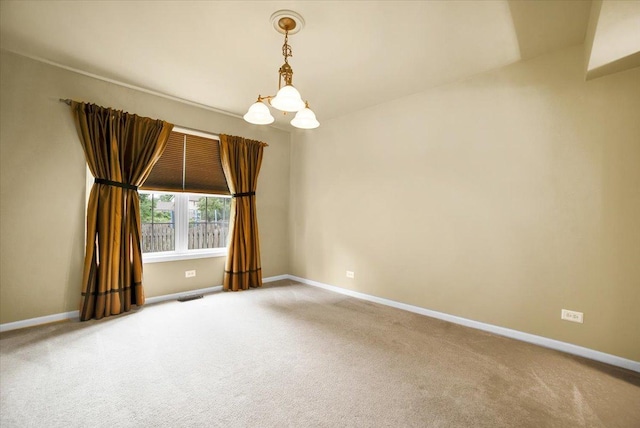 157 Concord Dr, Oswego, IL 60543 - empty room featuring a chandelier and light colored carpet