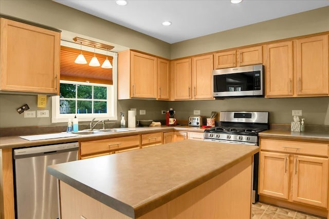 157 Concord Dr, Oswego, IL 60543 - kitchen with appliances with stainless steel finishes, light brown cabinetry, and recessed lighting