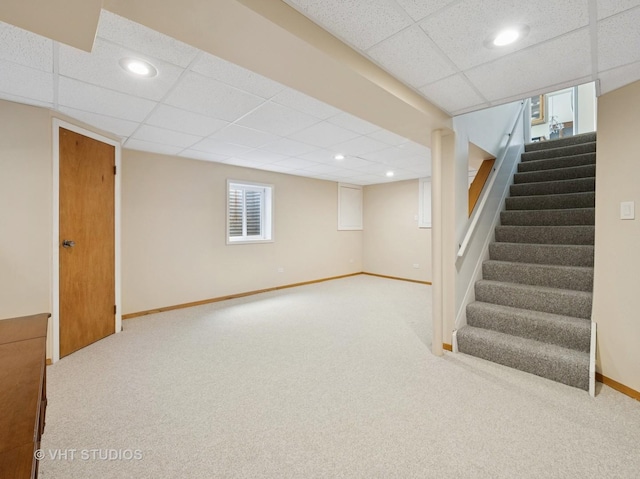 1135 Lexington Ln, Lake Zurich, IL 60047 - basement featuring a paneled ceiling, stairs, carpet, and recessed lighting