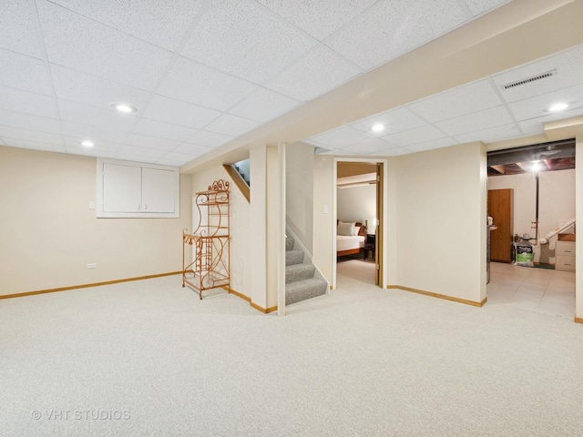 1135 Lexington Ln, Lake Zurich, IL 60047 - finished basement featuring a paneled ceiling, carpet floors, stairway, and recessed lighting