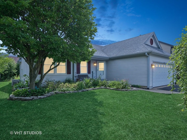 1135 Lexington Ln, Lake Zurich, IL 60047 - view of front facade with a garage, a front yard, a shingled roof, and asphalt driveway