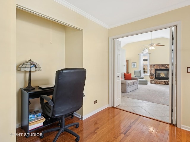1135 Lexington Ln, Lake Zurich, IL 60047 - office area with ornamental molding, a ceiling fan, wood-type flooring, and a fireplace