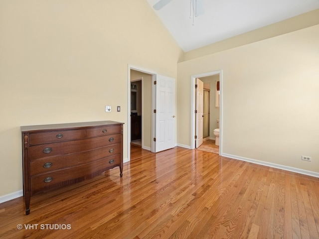 1135 Lexington Ln, Lake Zurich, IL 60047 - bedroom featuring light wood-style floors, connected bathroom, and high vaulted ceiling