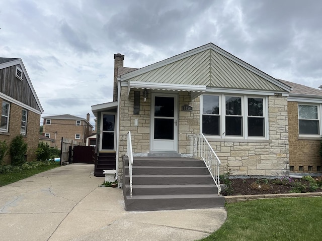 2256 S 15th Ave, North Riverside, IL 60546 - view of front of house with stone siding and a chimney