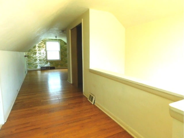 711 Glendale Ave, Rockford, IL 61108 - hall featuring vaulted ceiling and wood finished floors