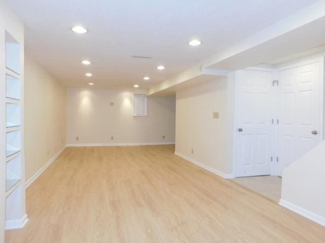 711 Glendale Ave, Rockford, IL 61108 - finished below grade area featuring recessed lighting and light wood-style flooring