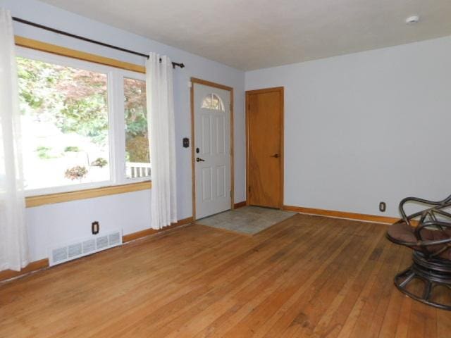 711 Glendale Ave, Rockford, IL 61108 - foyer with wood-type flooring and baseboards