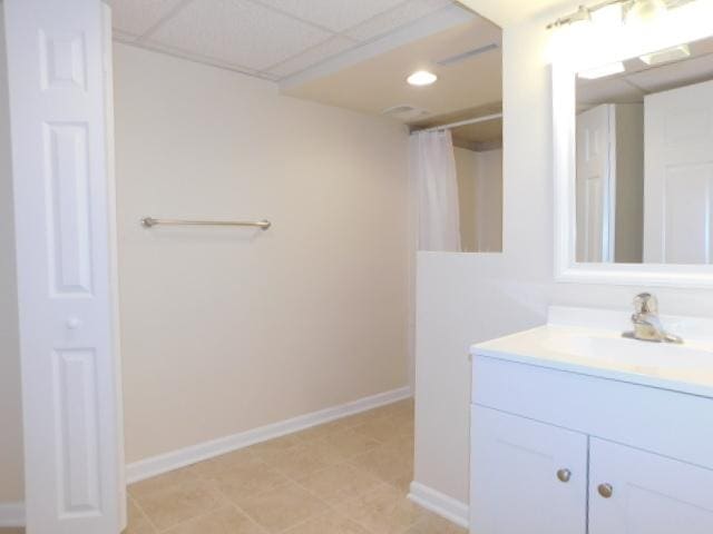 711 Glendale Ave, Rockford, IL 61108 - full bathroom featuring vanity and a shower with shower curtain
