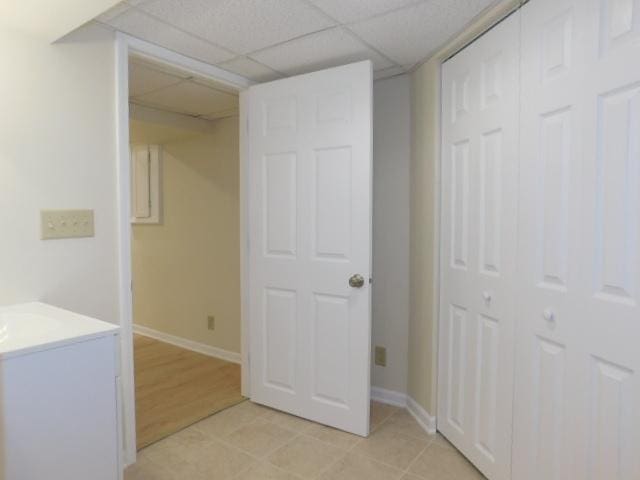 711 Glendale Ave, Rockford, IL 61108 - hall with baseboards and a drop ceiling