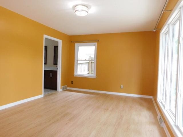 711 Glendale Ave, Rockford, IL 61108 - unfurnished room featuring light wood-style flooring and baseboards