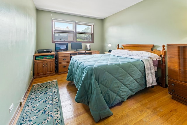 6955 N Dowagiac Ave, Chicago, IL 60646 - bedroom with light wood finished floors
