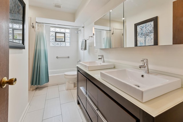 6955 N Dowagiac Ave, Chicago, IL 60646 - full bathroom with double vanity, shower / bath combo with shower curtain, and tile patterned flooring