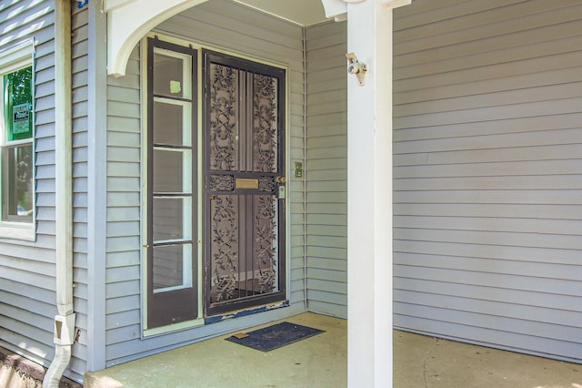 2630 Grunewald St, Blue Island, IL 60406 - view of exterior entry with a porch