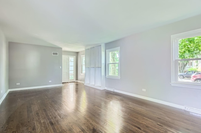2630 Grunewald St, Blue Island, IL 60406 - empty room featuring dark wood-style flooring and baseboards