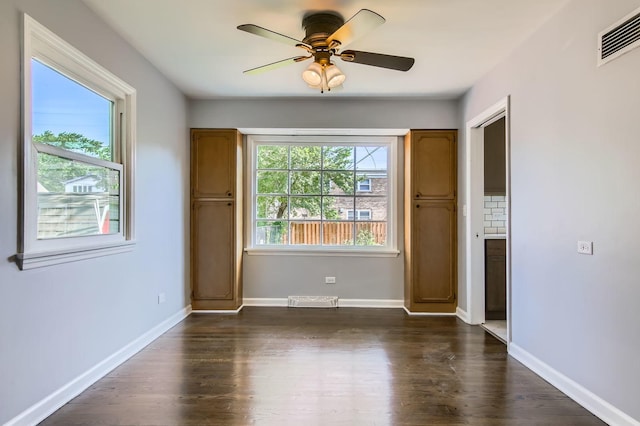 2630 Grunewald St, Blue Island, IL 60406 - spare room with a ceiling fan and dark wood-style flooring