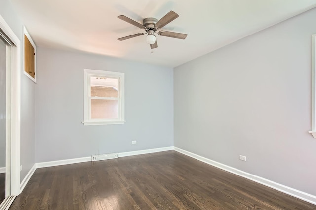 2630 Grunewald St, Blue Island, IL 60406 - spare room featuring ceiling fan and dark wood-style flooring