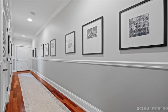 2340 W Roscoe St Unit 2W, Chicago, IL 60618 - hallway featuring crown molding, wood finished floors, and recessed lighting