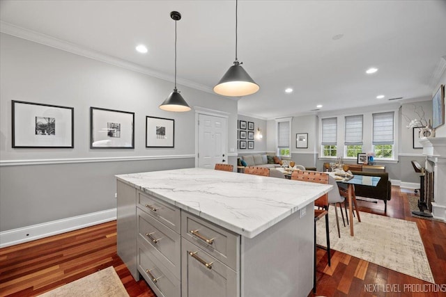 2340 W Roscoe St Unit 2W, Chicago, IL 60618 - kitchen with ornamental molding, gray cabinetry, a kitchen island, recessed lighting, and open floor plan