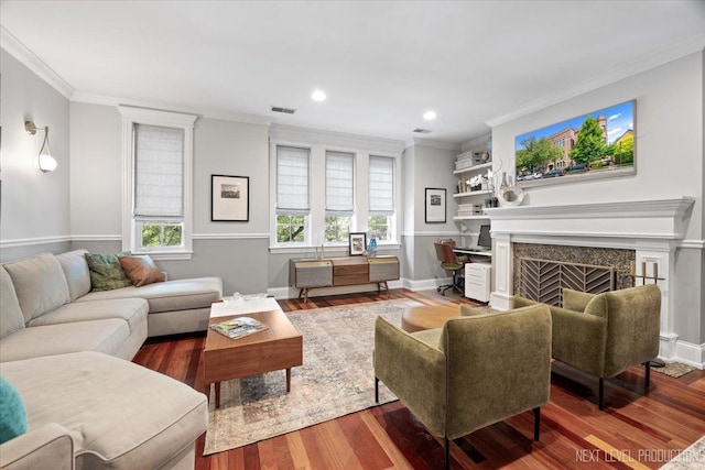 2340 W Roscoe St Unit 2W, Chicago, IL 60618 - living area featuring crown molding, wood finished floors, a premium fireplace, healthy amount of natural light, and recessed lighting
