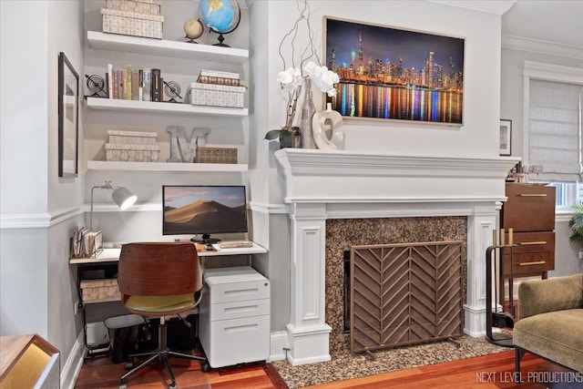 2340 W Roscoe St Unit 2W, Chicago, IL 60618 - interior space with wood finished floors, a tiled fireplace, and ornamental molding