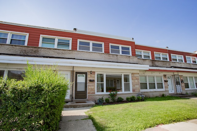 8909 N Washington St Unit E, Niles, IL 60714 - multi unit property with a front yard and brick siding