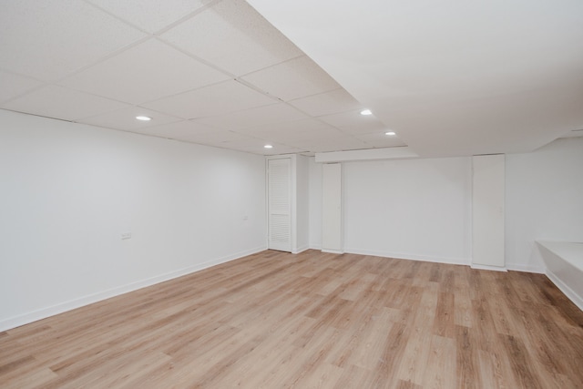 8909 N Washington St Unit E, Niles, IL 60714 - finished below grade area with recessed lighting and light wood-style floors