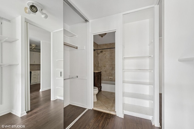 400 E Randolph St Unit 2902, Chicago, IL 60601 - spacious closet featuring ceiling fan and dark wood-type flooring