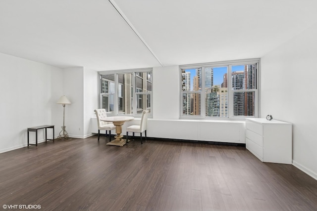 400 E Randolph St Unit 2902, Chicago, IL 60601 - empty room featuring dark wood finished floors, healthy amount of natural light, and a view of city
