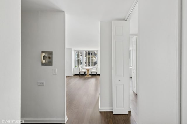 400 E Randolph St Unit 2902, Chicago, IL 60601 - hall with dark wood-style floors and baseboards