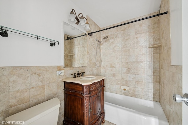 400 E Randolph St Unit 2902, Chicago, IL 60601 - bathroom featuring tile walls, washtub / shower combination, and vanity