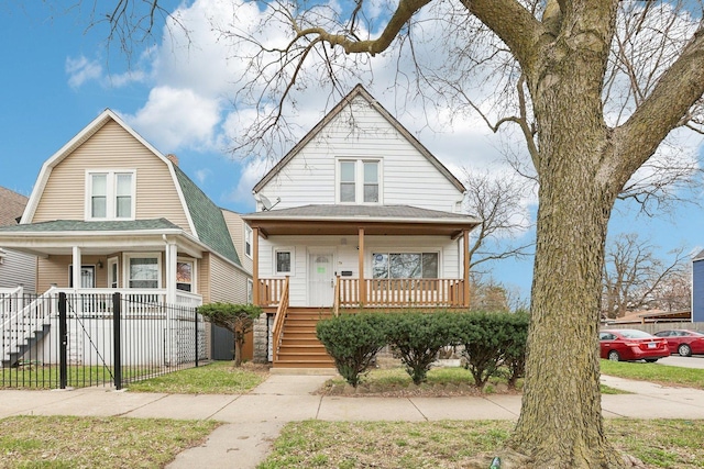 7959 S Saginaw Ave, Chicago, IL 60617 - view of front of property with covered porch and stairs