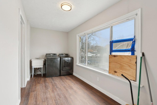 7959 S Saginaw Ave, Chicago, IL 60617 - laundry room featuring washer and dryer and wood finished floors