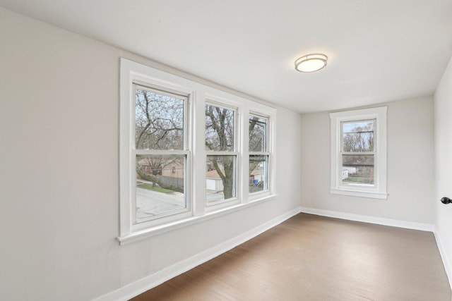 7959 S Saginaw Ave, Chicago, IL 60617 - empty room with wood finished floors and healthy amount of natural light