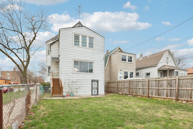 7959 S Saginaw Ave, Chicago, IL 60617 - rear view of property with a fenced backyard