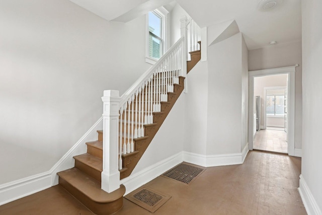 7959 S Saginaw Ave, Chicago, IL 60617 - stairway with baseboards and wood finished floors