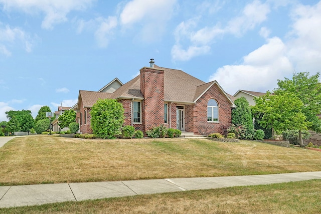 1824 Mia Dr, Crest Hill, IL 60403 - view of front of home with brick siding, a front lawn, roof with shingles, and a chimney