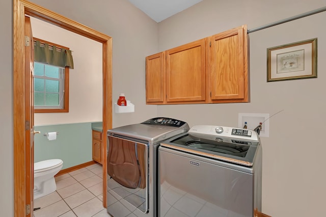 1824 Mia Dr, Crest Hill, IL 60403 - laundry room with washer and dryer, light tile patterned floors, and cabinet space