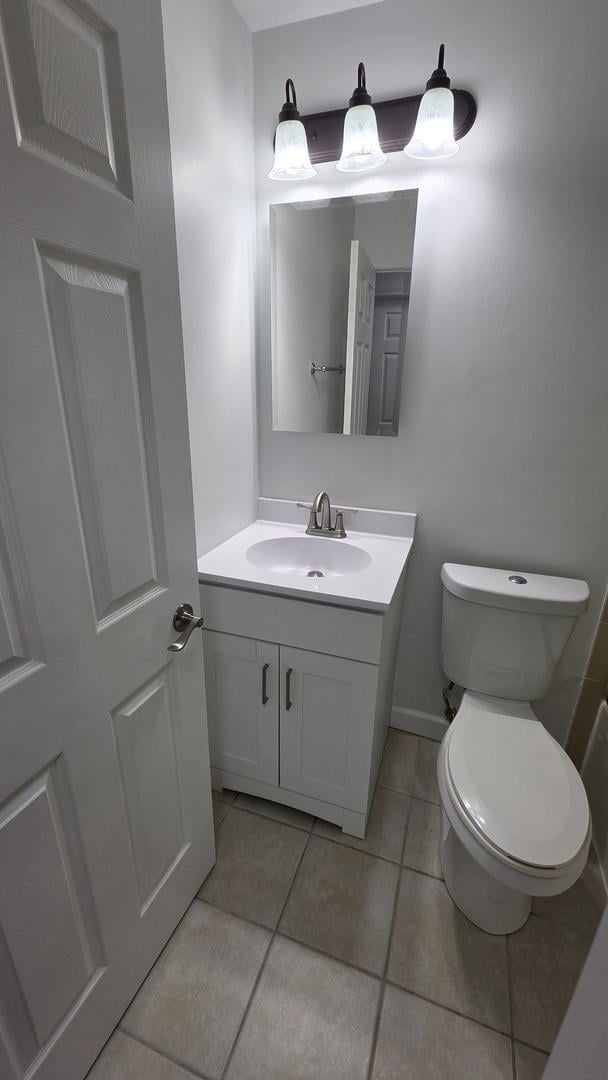 1303 Kingsbury Dr Unit A, Hanover Park, IL 60133 - bathroom featuring vanity and tile patterned flooring