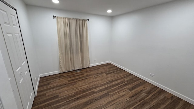 1303 Kingsbury Dr Unit A, Hanover Park, IL 60133 - empty room with recessed lighting and dark wood-type flooring