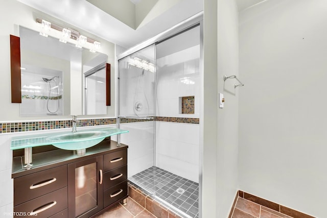 1621 Mission Hills Rd Unit 510, Northbrook, IL 60062 - full bath featuring a stall shower, vanity, tile patterned floors, and decorative backsplash